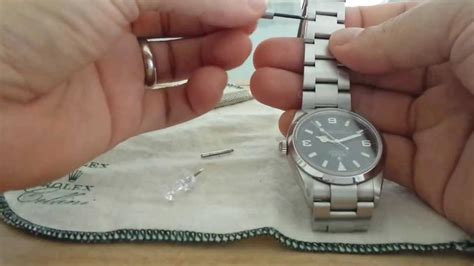 adjusting rolex oyster watch band.